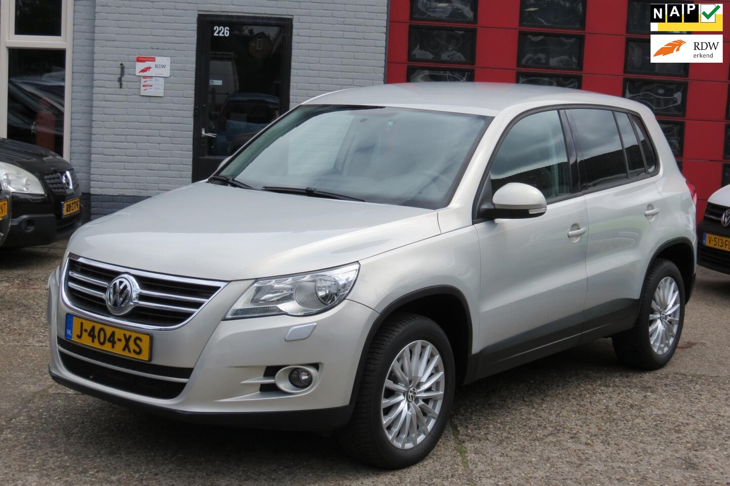 Volkswagen Tiguan - 2.0 TSI Sport&Style 4Motion ,AUTOMAAT , NWE APK - AutoWereld.nl