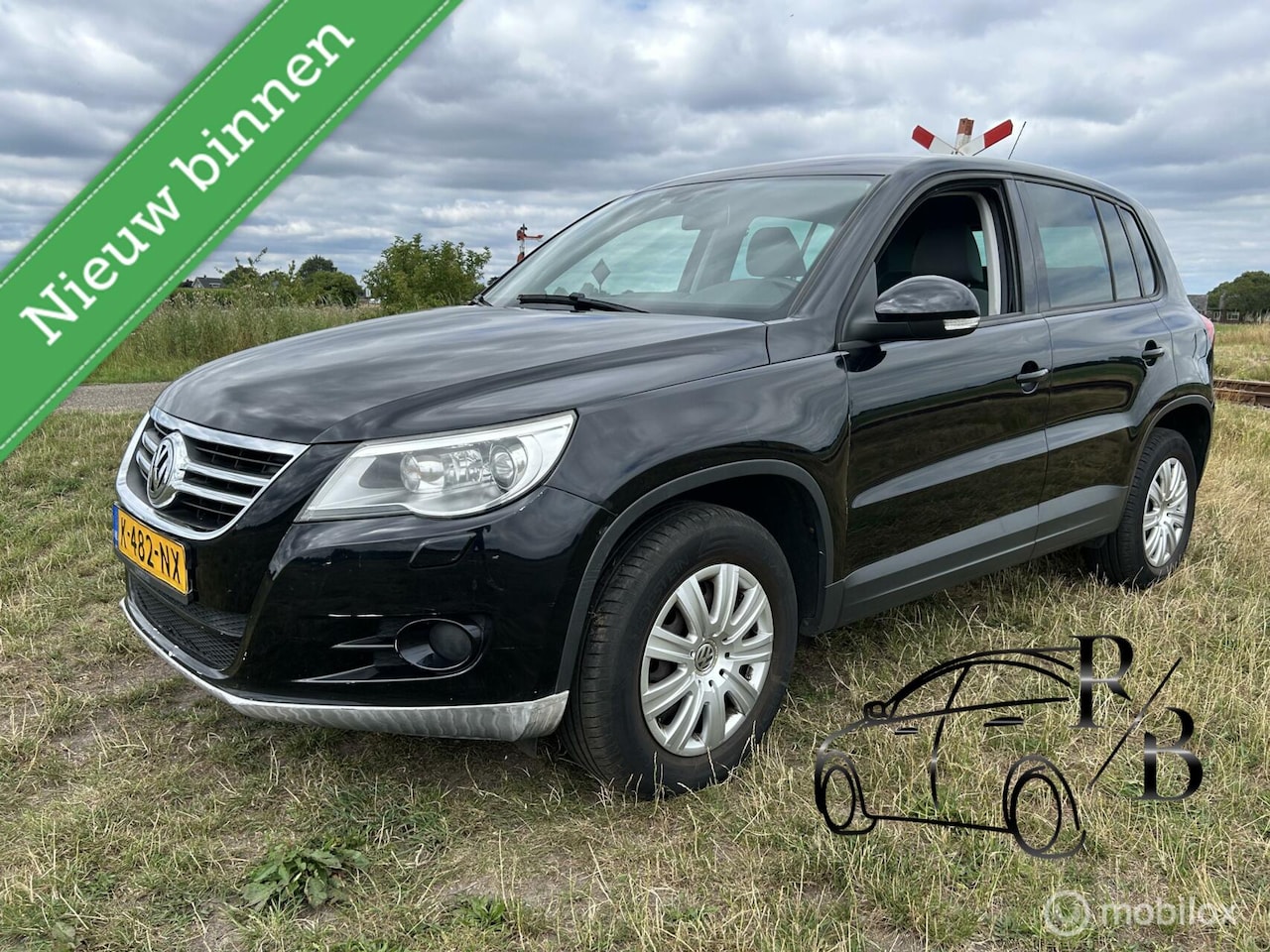 Volkswagen Tiguan - 1.4 TSI Sport&Style AIRCO NAVI LEES TEKST - AutoWereld.nl