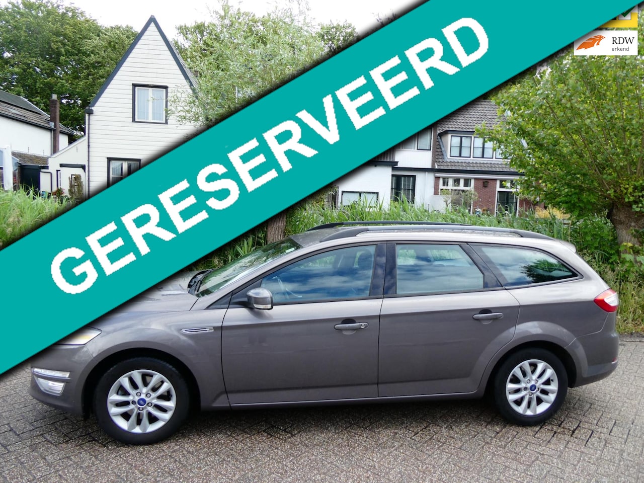 Ford Mondeo Wagon - 1.6i 160pk 1e eig. Clima Cruise Navi Trekhaak 1600kg - AutoWereld.nl