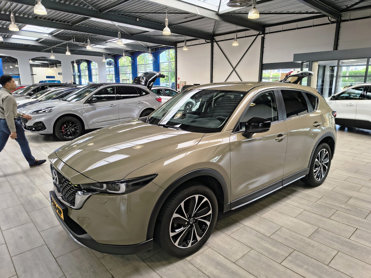 Mazda CX-5 - 2.0 SkyActiv-G 165 pk Newground | Trekhaak | 360° Camera | El. a. klep | Half leer | Stoel - AutoWereld.nl