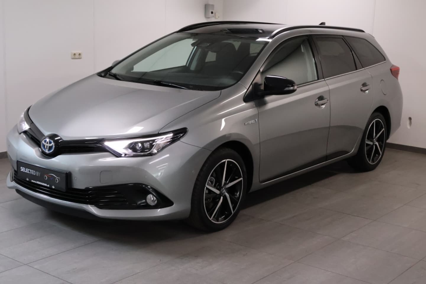 Toyota Auris - 1.8 Hybrid TS - AutoWereld.nl