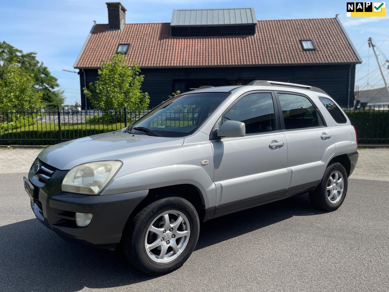 Kia Sportage - 2.0 CVVT X-ecutive AIRCO/ECC NAVIGATIE LPG-g3 - AutoWereld.nl