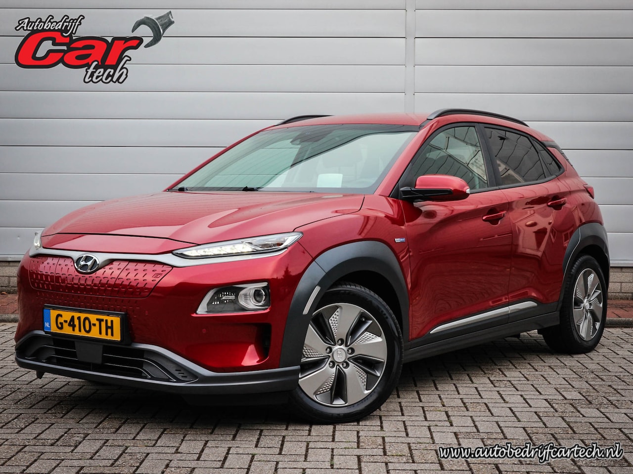 Hyundai Kona Electric - EV Premium 64 kWh | Clima | Cruise | Navi | Leer | Stoel/stuur verwarming | Pdc | Camera | - AutoWereld.nl