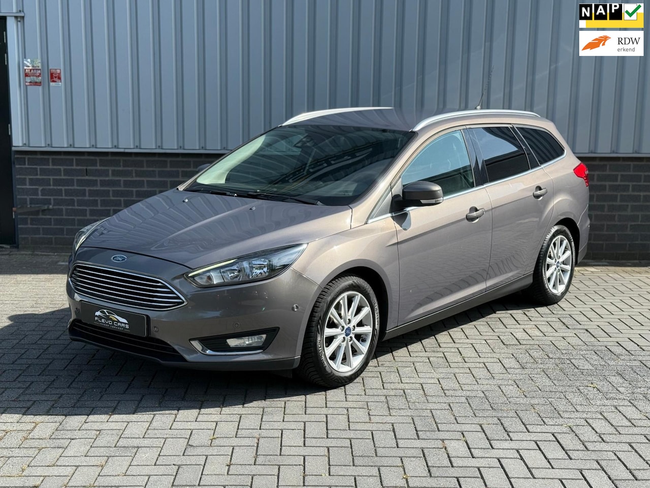 Ford Focus Wagon - 1.5 Titanium Edition |Navi|CruiseCtrl|Keyless|Stoelverwarming| - AutoWereld.nl