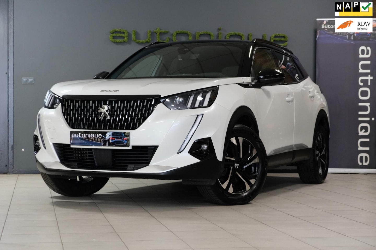 Peugeot 2008 - 1.2 PureTech GT *36dkm* Zwartdak/Navi/Camera/Trekhaak NIEUWSTAAT - AutoWereld.nl
