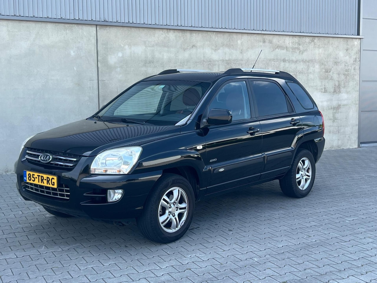 Kia Sportage - 2.7 V6 M-bition 4WD LPG AUTOMAAT+CAMERA+LEDER+STOELVERWARMING+CRUISE+CLIMATE AIRCO+GROOT S - AutoWereld.nl