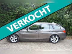 BMW 3-serie Touring - 328i High Exe trekhaak/memory/camera