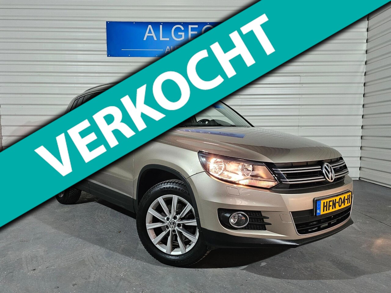 Volkswagen Tiguan - 2.0 TSI Sport&Style 4Motion / Trekhaak - AutoWereld.nl
