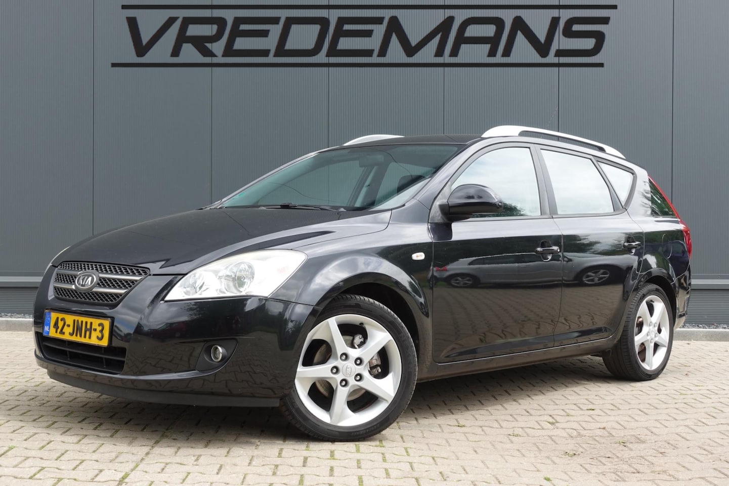 Kia Cee'd Sporty Wagon - 1.4 X-ecutive ISG 1.4 X-ecutive ISG - AutoWereld.nl