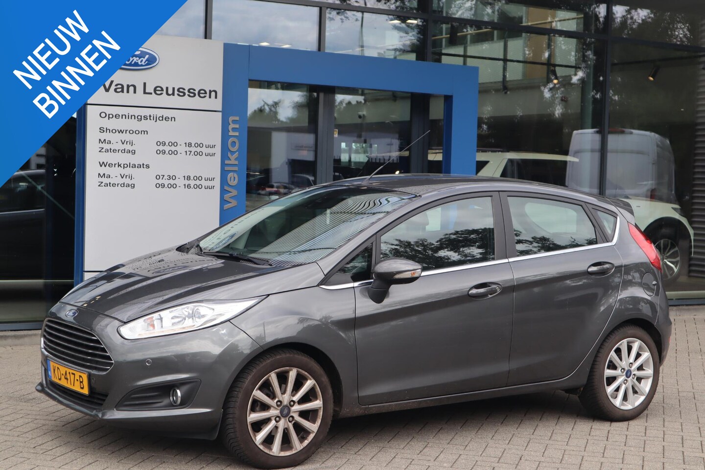 Ford Fiesta - 100PK TITANIUM 5-DEURS AUTOMAAT NAVI CLIMA TREKHAAK PARK-SENSOREN VOORRUITVERWARMING CRUIS - AutoWereld.nl