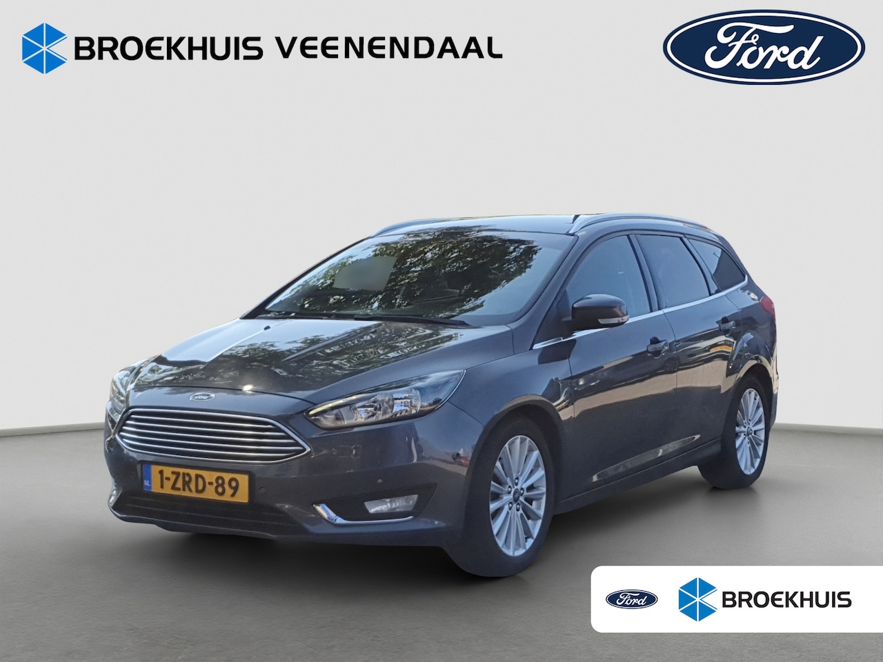 Ford Focus Wagon - 1.0 EcoB 125PK Titanium Navigatie | Trekhaak - AutoWereld.nl