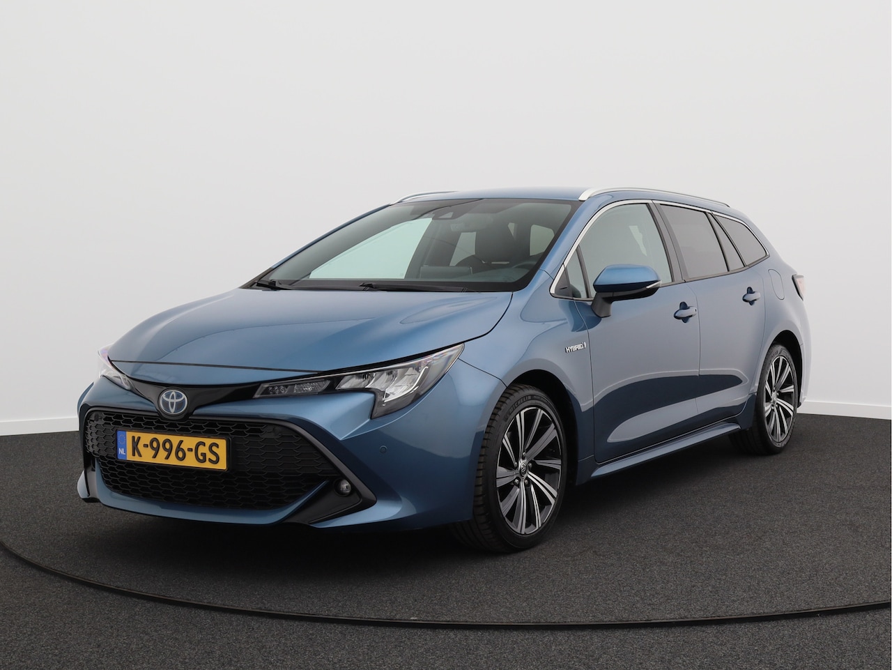 Toyota Corolla Touring Sports - 1.8 Hybrid Business Plus/ lage km/ trekhaak! - AutoWereld.nl