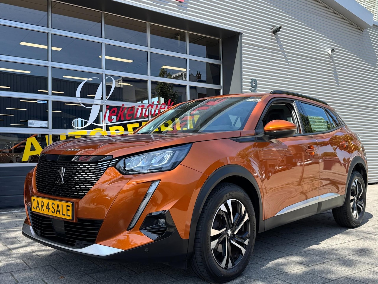 Peugeot 2008 - 1.2 PureTech Allure - Navigatie/Apple I Airco I LED I PDC & Achteruitrij camera I Sport ve - AutoWereld.nl