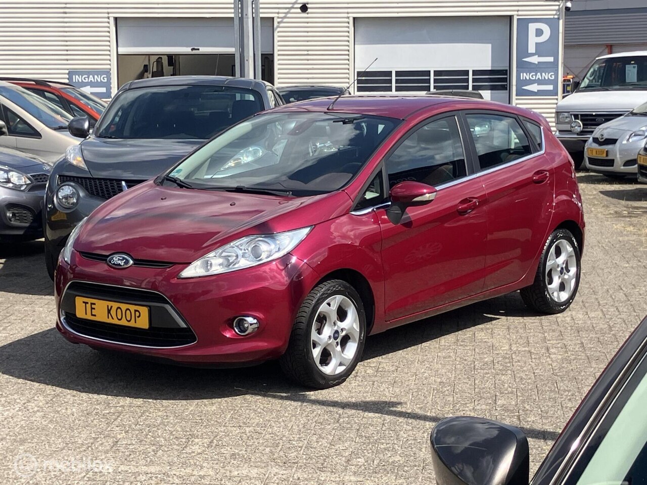 Ford Fiesta - 1.25 Ghia 1.25 Ghia 5-drs - AutoWereld.nl