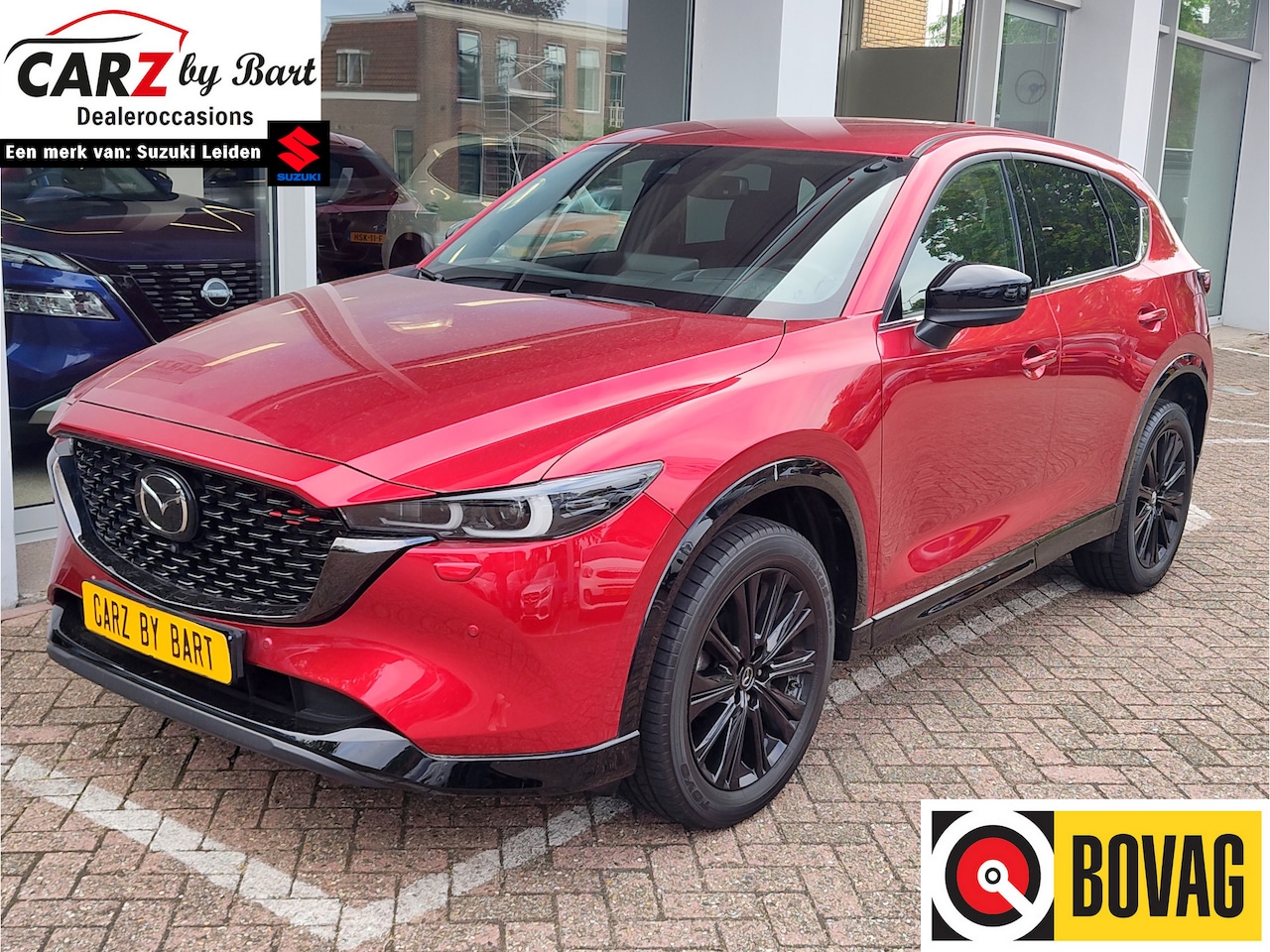 Mazda CX-5 - 2.0 SKYACTIV-G 165 HOMURA AUTOMAAT Head Up Display | Stuurverwarming | Keyless - AutoWereld.nl