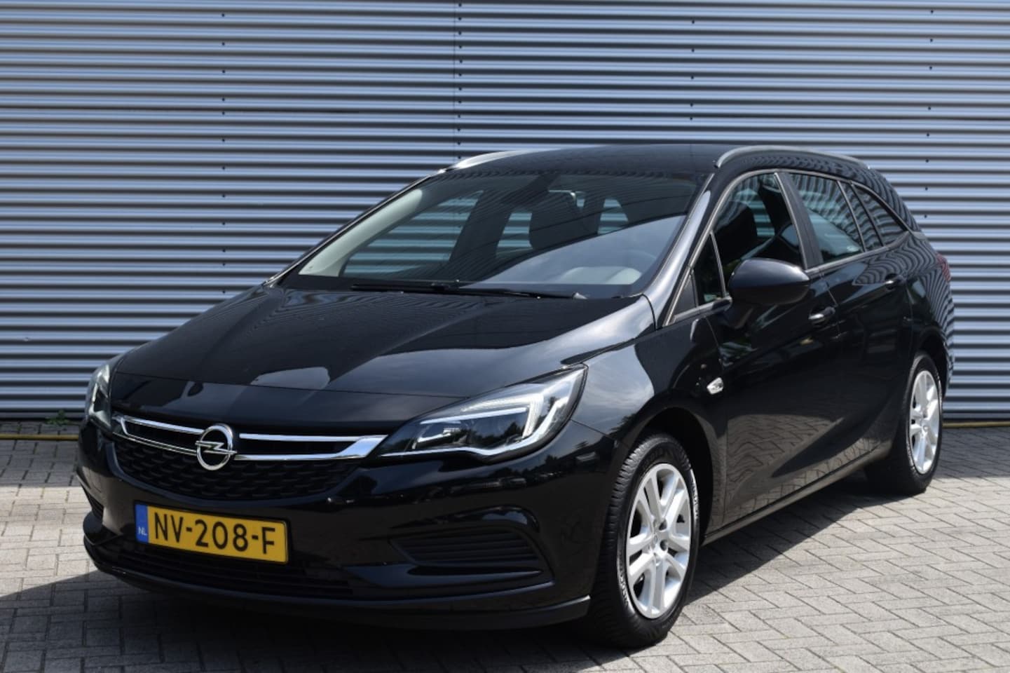 Opel Astra Sports Tourer - SPORTS TOURER 1.0 ONLINE ED. / P.CAM. / APPLE CARPLAY + NAVI / AFN. HAAK - AutoWereld.nl