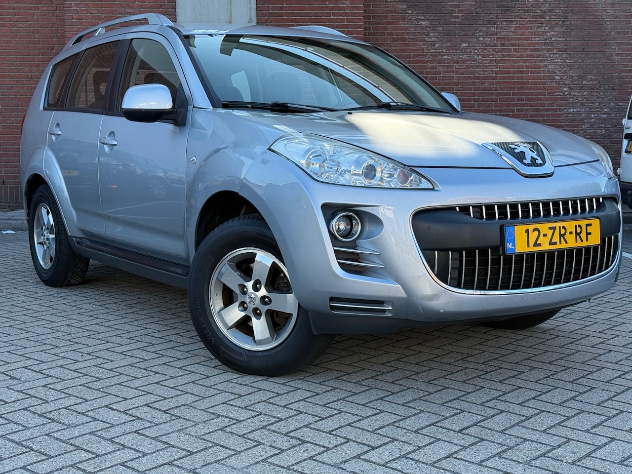 Peugeot 4007 - 2.4 ST 7p.|4x4|NAVI|CAMARA|TREKHAAK - AutoWereld.nl