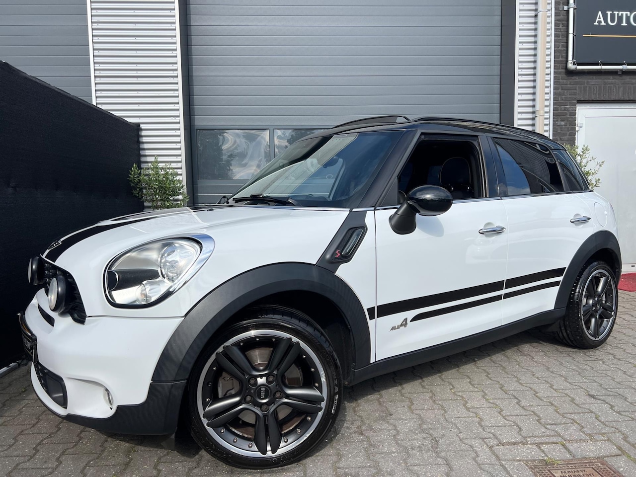 MINI Countryman - Mini 1.6 Cooper S | Schuifdak | Navi | Leder |Johnyworksuitlaat - AutoWereld.nl