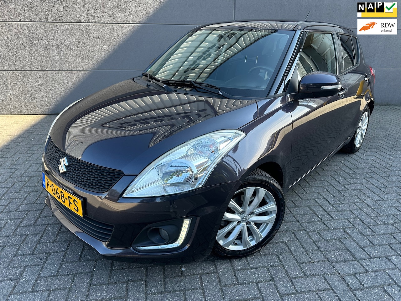 Suzuki Swift - 1.2 Comfort EASSS*NEW APK*STOEL VERWARMING*NAP*NAVI*CRUISE*AIRCO*CAMERA*VELGEN*ELKT-RAAM - AutoWereld.nl