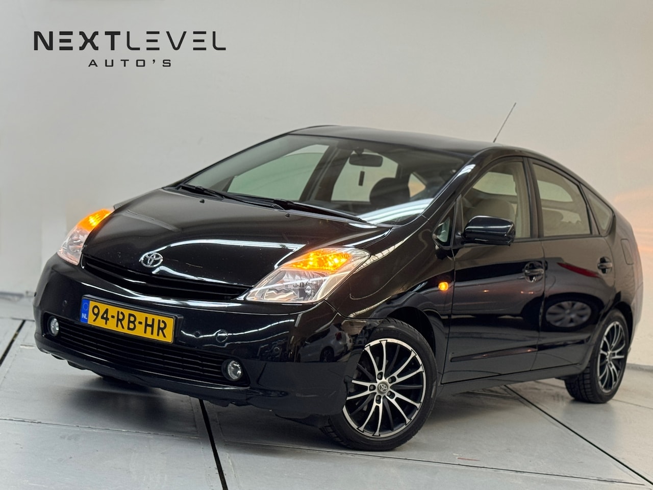 Toyota Prius - 1.5 VVT-i Hybrid AUT Airco Navi PDC Nieuwe Apk - AutoWereld.nl