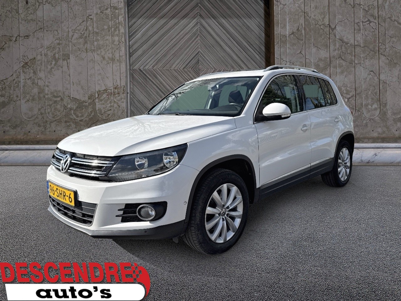 Volkswagen Tiguan - 1.4 TSI Sport&Style 160 pk - AutoWereld.nl