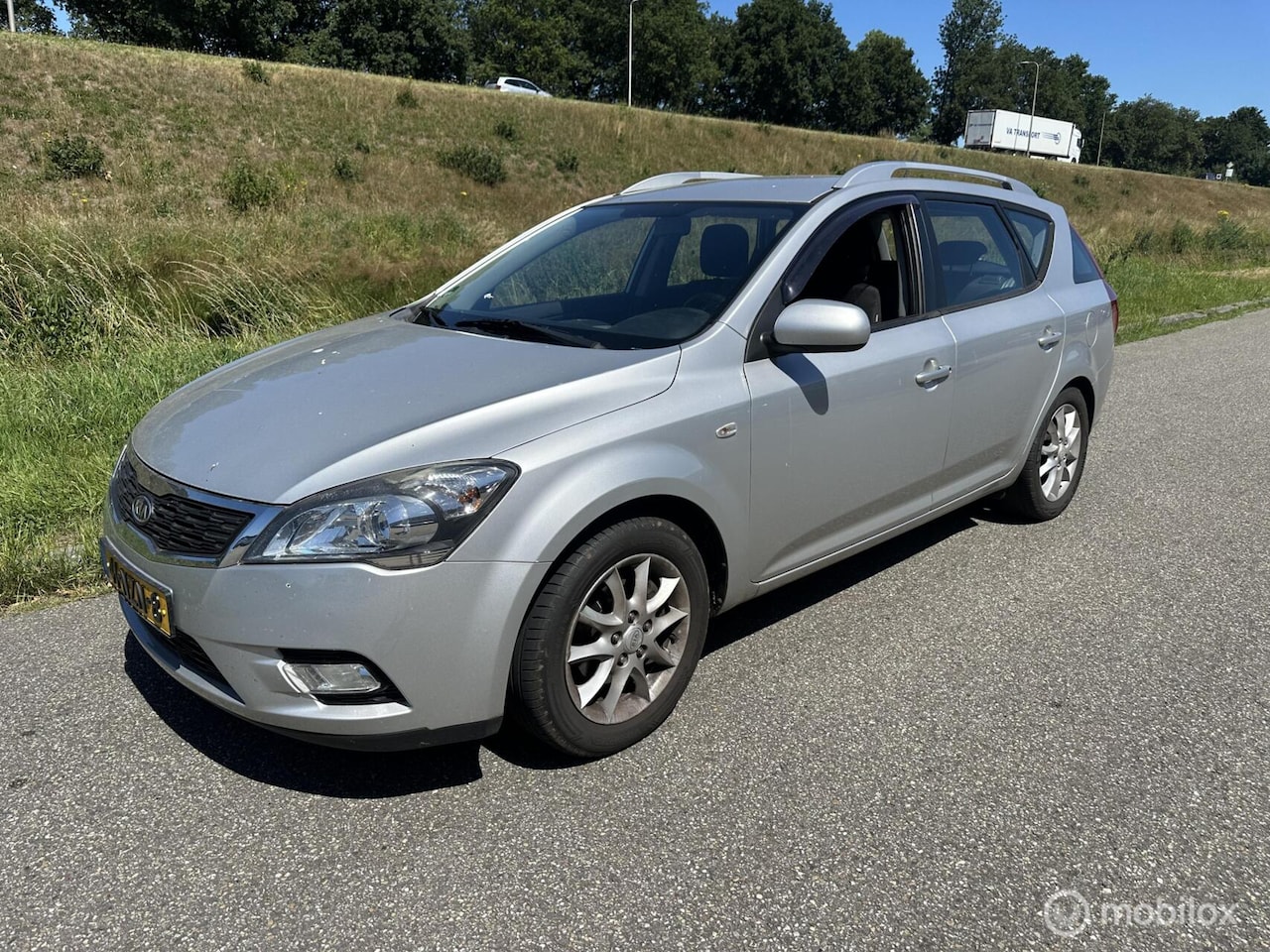 Kia Cee'd Sporty Wagon - 1.4 CVVT X-ecutive lpg - AutoWereld.nl