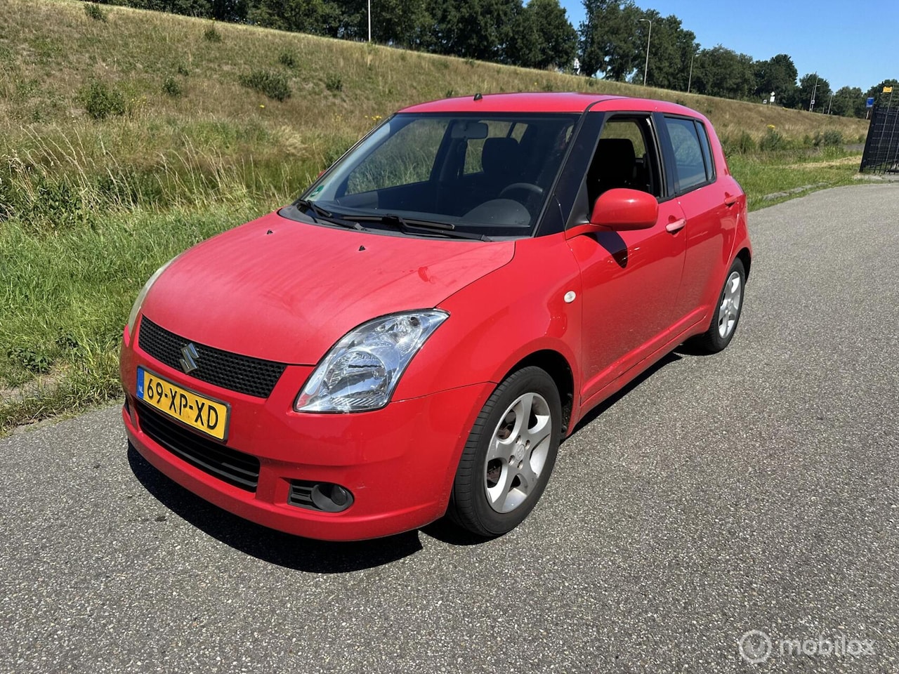 Suzuki Swift - 1.3 GA airco 5 deurs 150.000 km - AutoWereld.nl