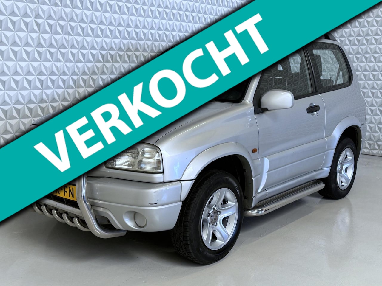 Suzuki Grand Vitara - 1.6 Metal Top Wide Body 4X4 (2004) - AutoWereld.nl