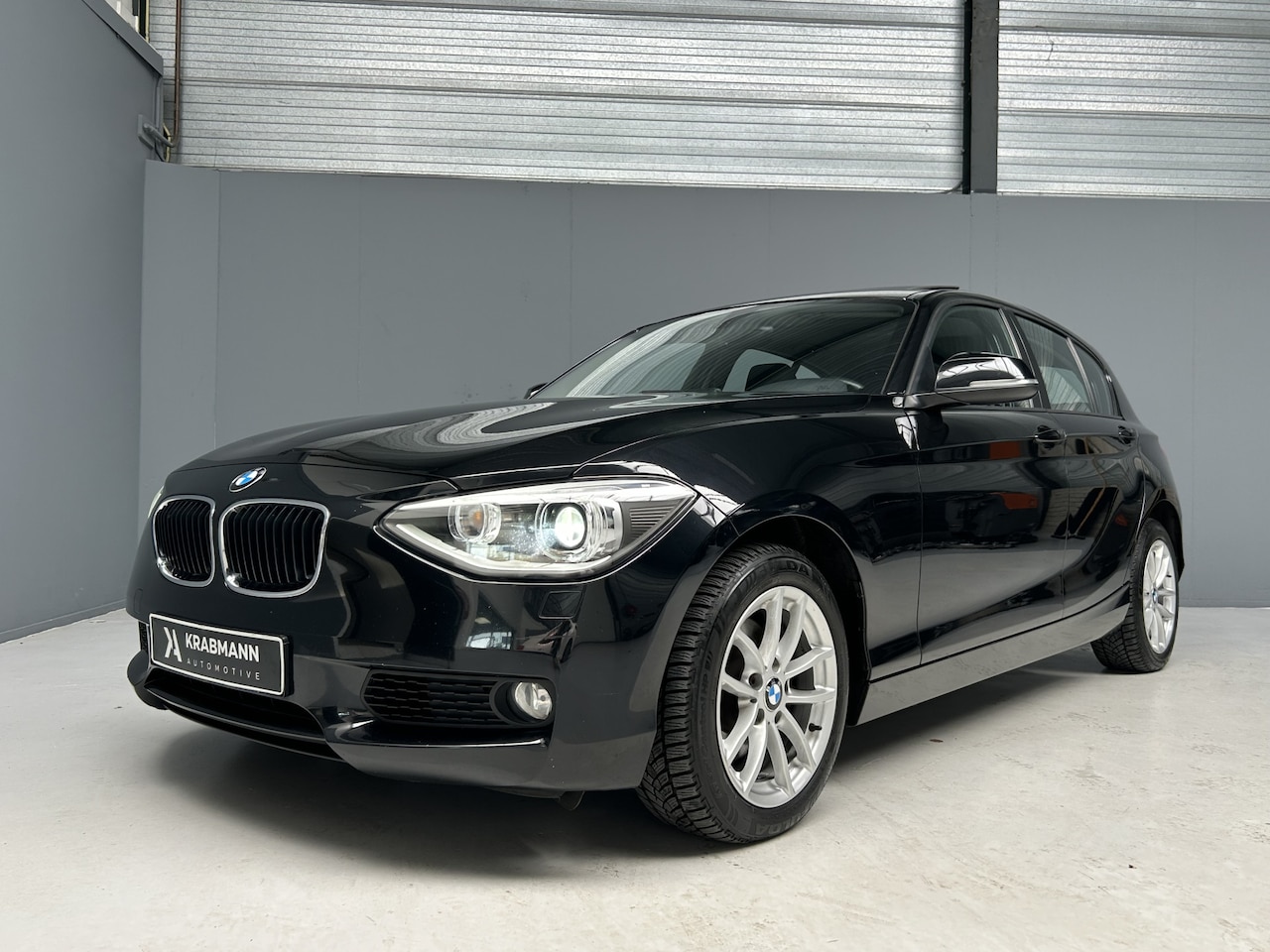 BMW 1-serie - 118i High Executive Cruise|Navi|Xenon - AutoWereld.nl