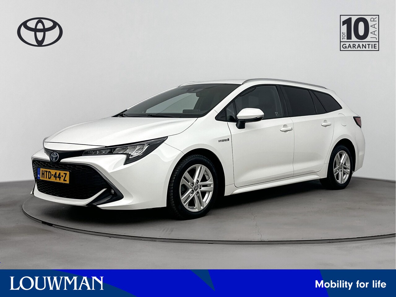 Toyota Corolla Touring Sports - 1.8 Hybrid Active Luxury | Stoel -/ Stuur Verwarming | Apple Carplay & Android Auto | Park - AutoWereld.nl