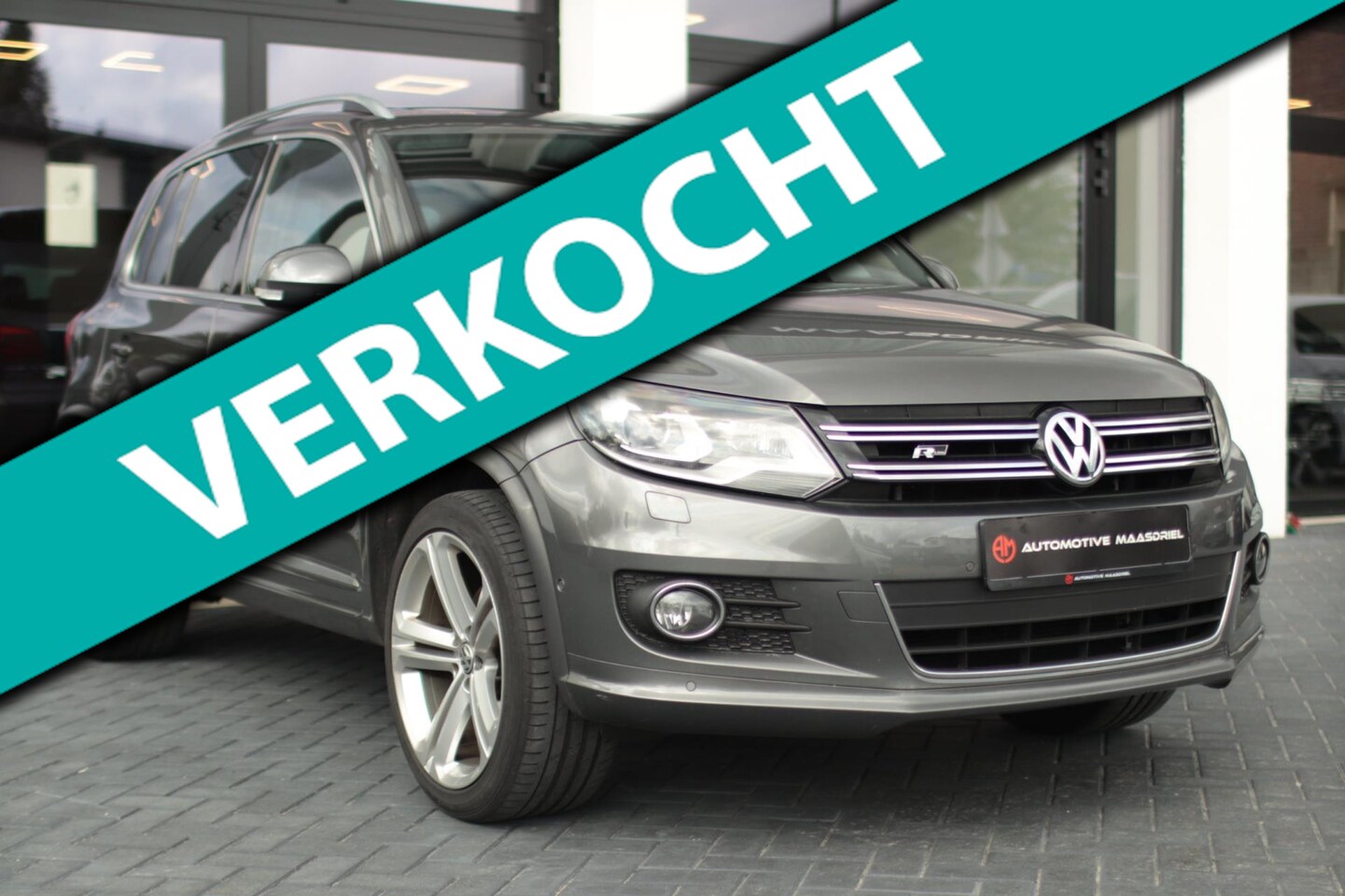 Volkswagen Tiguan - 2.0 TSI 4Motion|R-Line|DSG|Xenon|Navi|CC|Camera - AutoWereld.nl