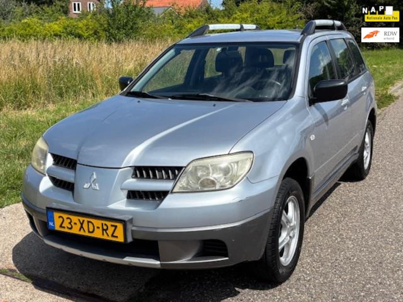 Mitsubishi Outlander - 2.0 Comfort Airco Electric pakket LMV 16" ABS Getint glas Dakrails Trekhaak Dealeronderhou - AutoWereld.nl