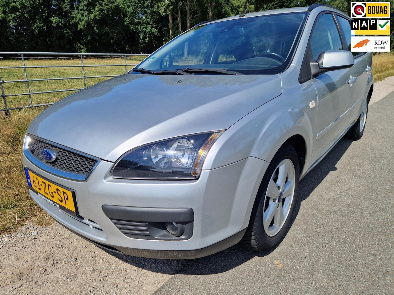 Ford Focus Wagon - 1.8-16V Ambiente Flexifuel stoelver airco cruise contr. - AutoWereld.nl