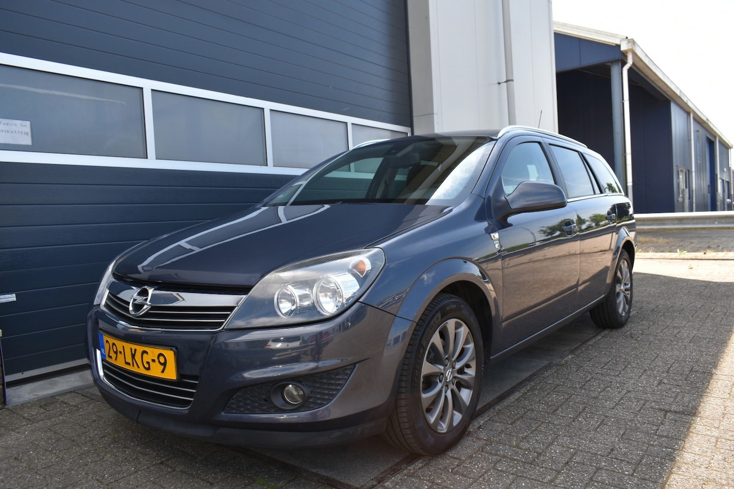 Opel Astra Wagon - 1.6 Cosmo 111 weinig km. - AutoWereld.nl