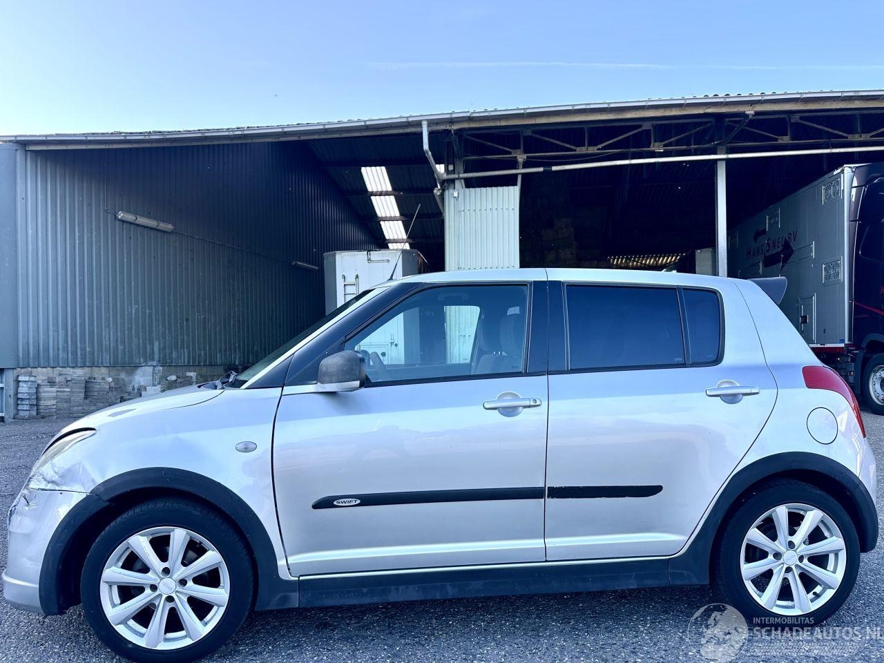 Suzuki Swift - 1.3i 92pk GLS 5drs - nap - airco - camera - touchscreen multimedia - bleutooth - alcantara - AutoWereld.nl