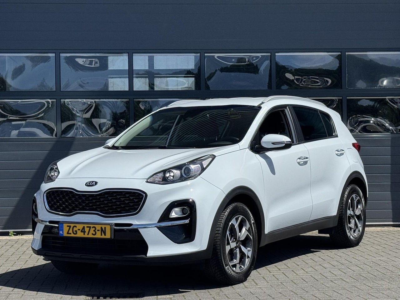 Kia Sportage - 1.6 T-GDI 4WD DYNAMICLINE I AUTOMAAT I TREKHAAK 1600KG I ACHTERUITRIJCAMERA I APPLE CARPLA - AutoWereld.nl