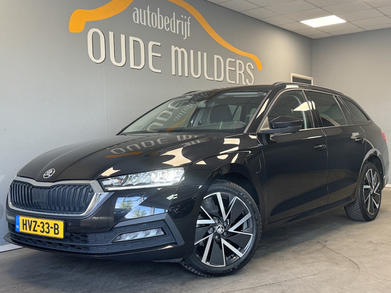 Skoda Octavia Combi - 1.4 TSI iV PHEV Business Edition Cruise/Camera/Carplay - AutoWereld.nl
