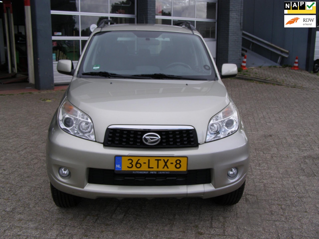 Daihatsu Terios - 1.5 2WD Trophy met climate en cruise control en trekhaak - AutoWereld.nl