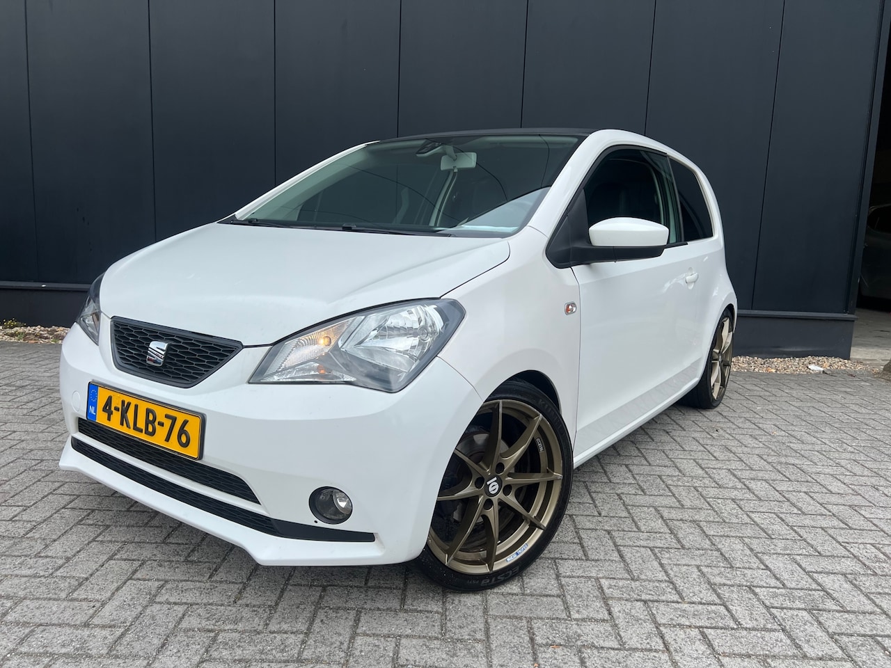 SEAT Mii - 1.0 Style Sport '13 Airco/17'Lmv/Nap/Leer - AutoWereld.nl