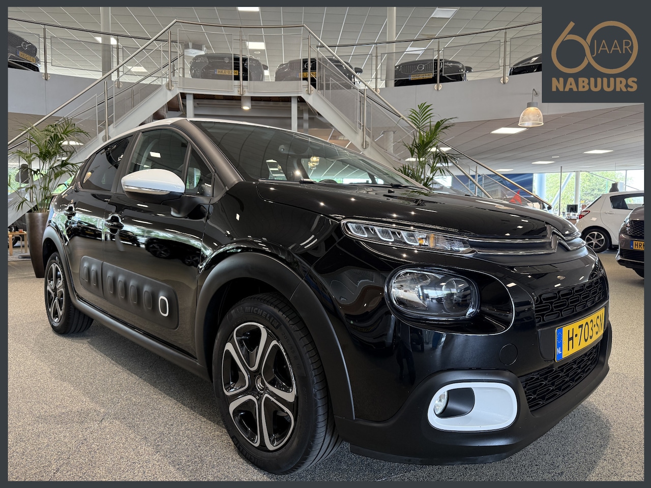 Citroën C3 - 1.2 82pk Feel Edition, NL auto, Navi, Clima - AutoWereld.nl