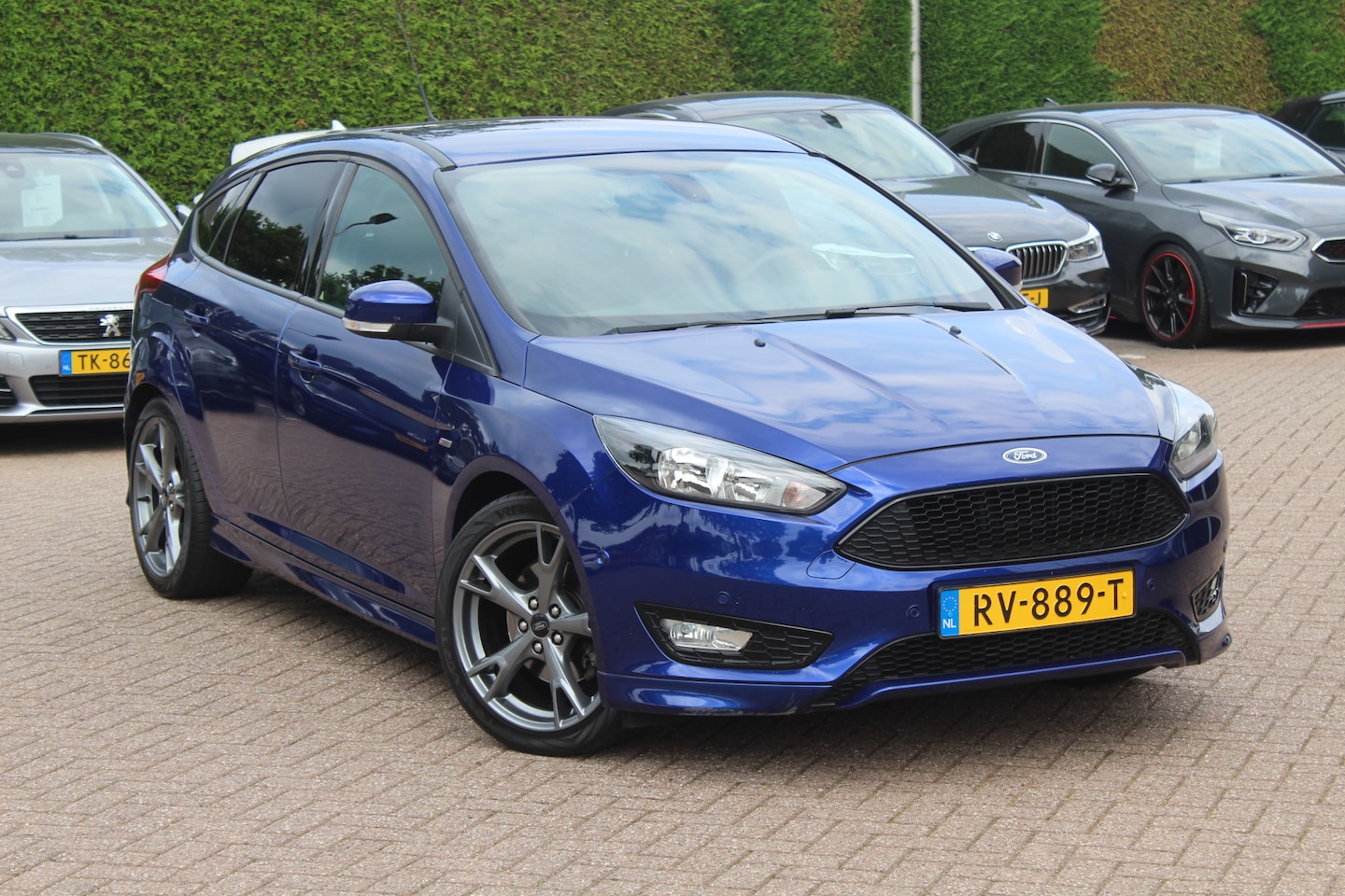 Ford Focus - 1.5 ST-Line / Trekhaak / Navigatie / Parkeerhulp V+A / 18'' / Xenon / Cruise Control - AutoWereld.nl