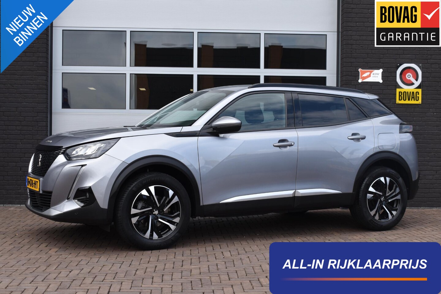 Peugeot 2008 - 1.2 130PK PureTech Allure Pack | Camera | Navi | Incl. garantie - AutoWereld.nl