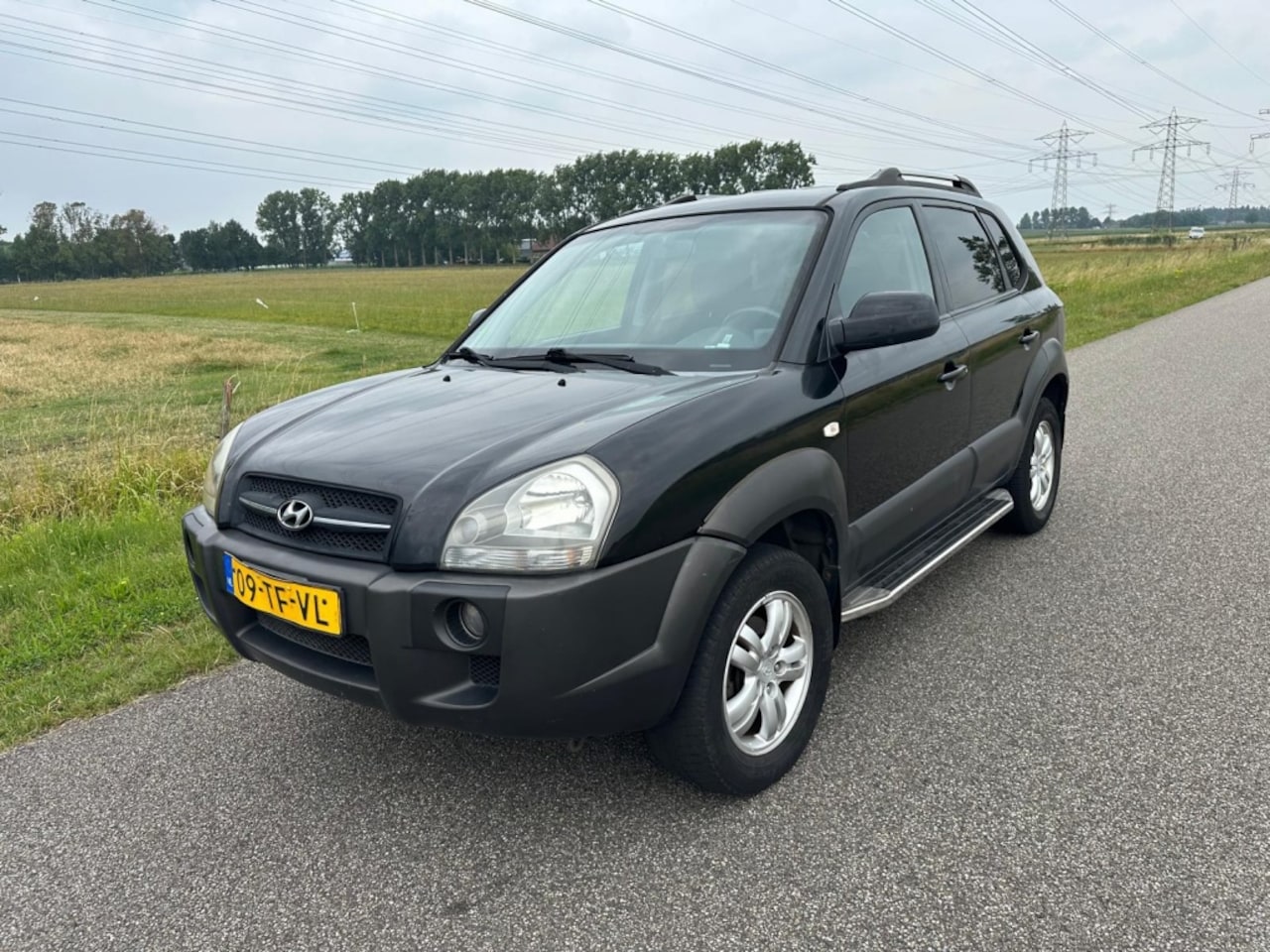 Hyundai Tucson - 2.0i Style CLIMA AIRCO / NAP ! - AutoWereld.nl