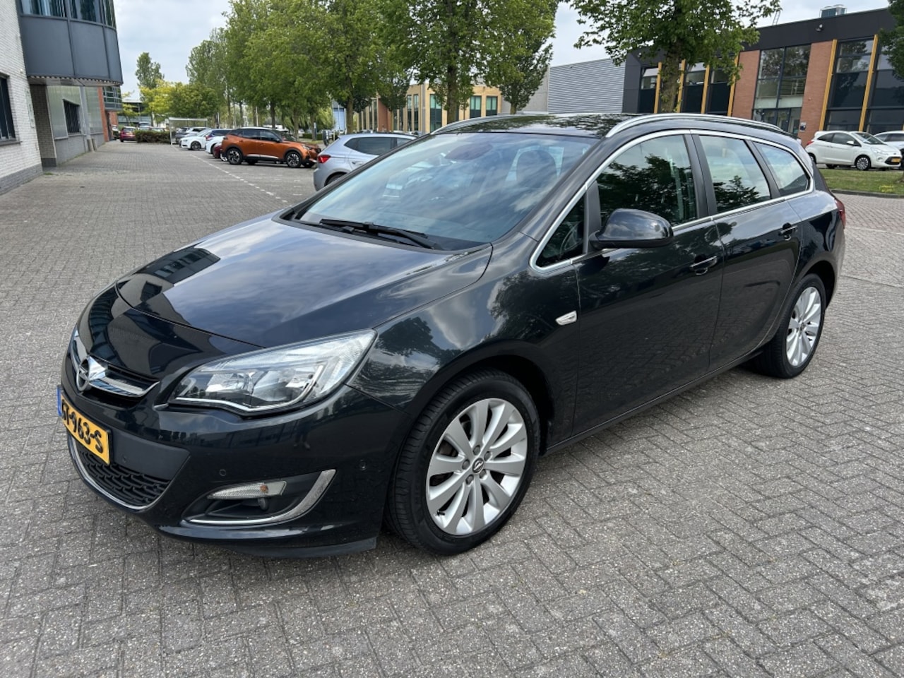Opel Astra Sports Tourer - 1.4 Turbo Sport 140PK NAVI PDC CRUISE CLIMA TRHK - AutoWereld.nl
