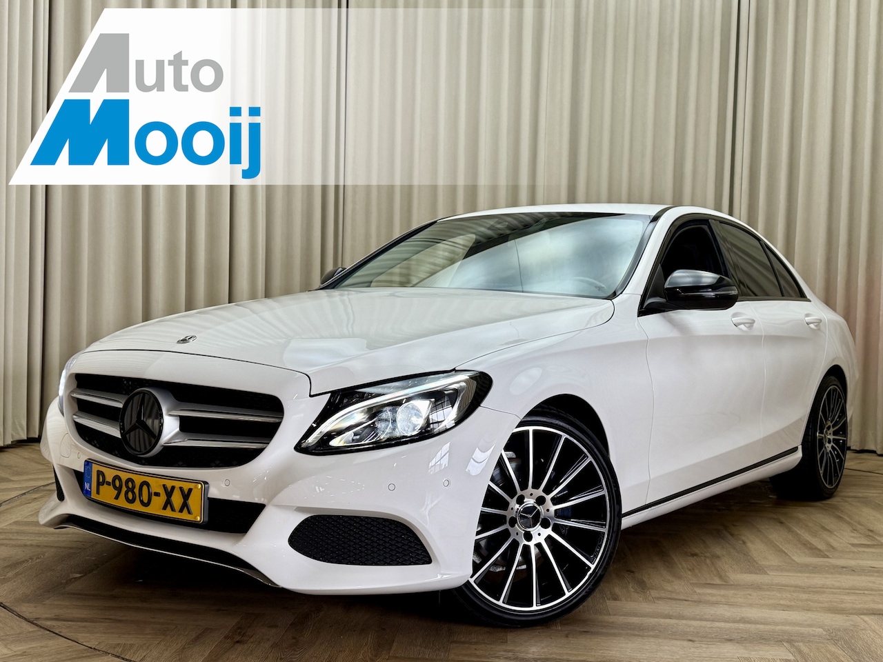 Mercedes-Benz C-klasse - 250 Premium Plus *211PK* 19'' AMG LMV / Stoelverwarming / LED / Ambient / 1/2 Leder / Navi - AutoWereld.nl