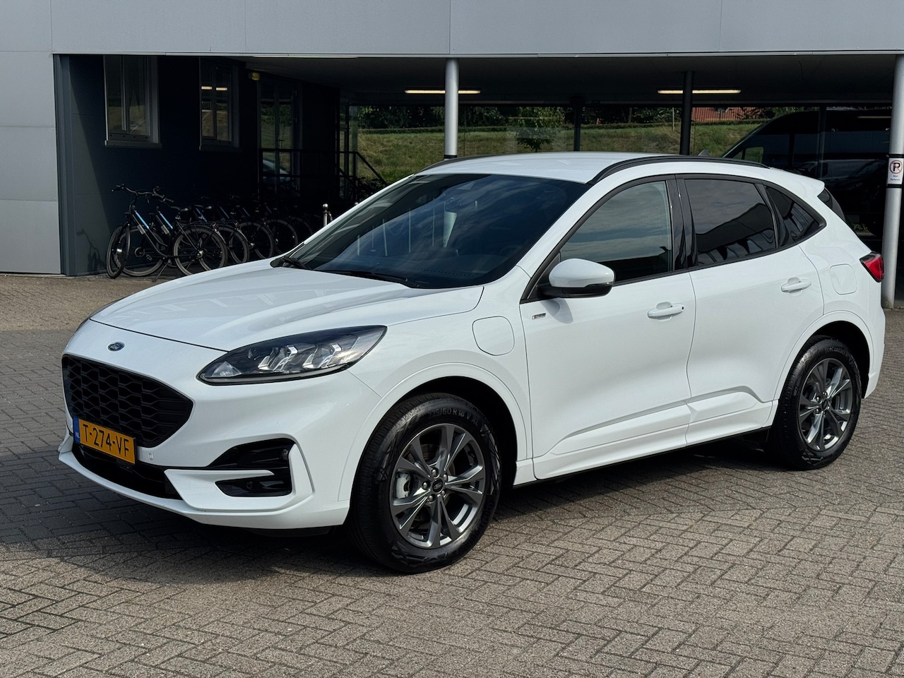 Ford Kuga - 2.5 PHEV 225PK ST-Line AUTOMATIC | Lichtmetalen velgen 18" | Trekhaak | Navigatiesysteem f - AutoWereld.nl