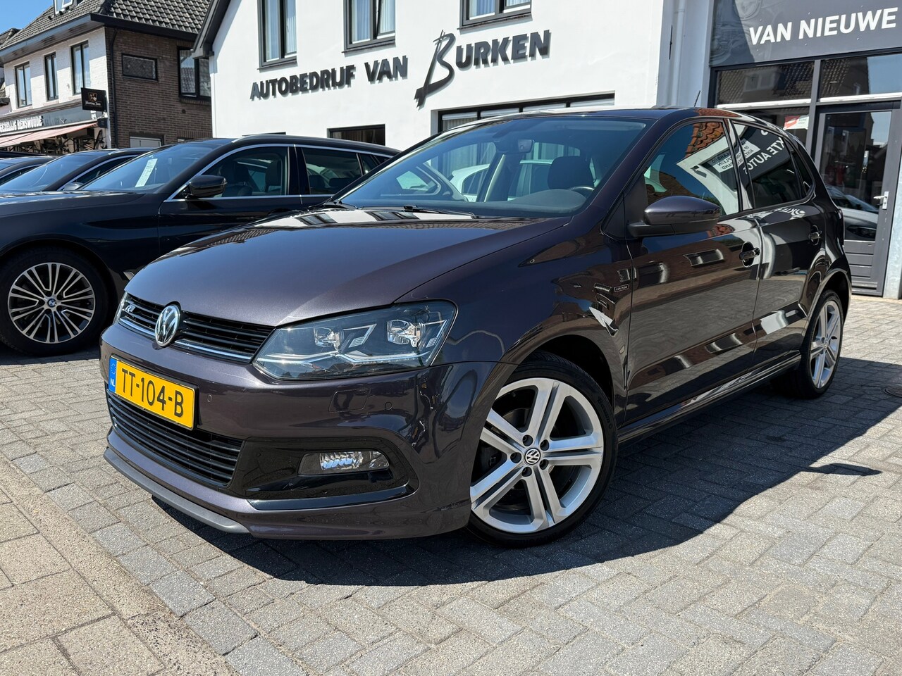 Volkswagen Polo - 1.2 TSI Highline R-Line,Stoelverwarming,Apple Carplay/Android,Navigatie - AutoWereld.nl