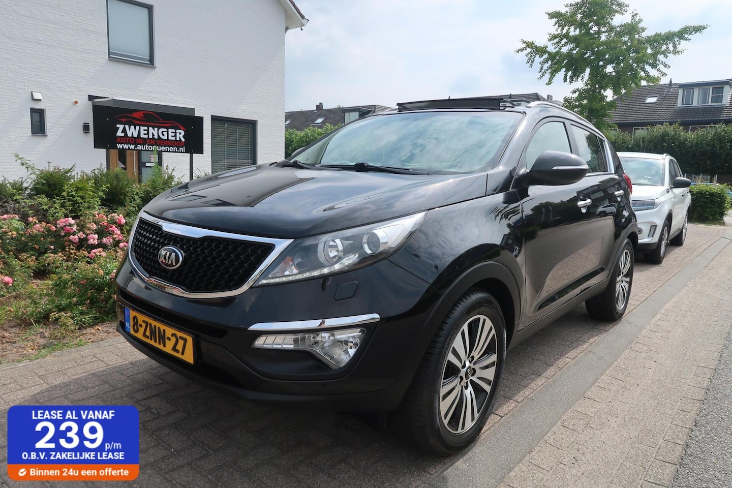Kia Sportage - 2.0 166pk|PANORAMADAK|TREKHAAK|CAMERA|LEDER|NAVIGATIE|XENON-LED|PDC - AutoWereld.nl