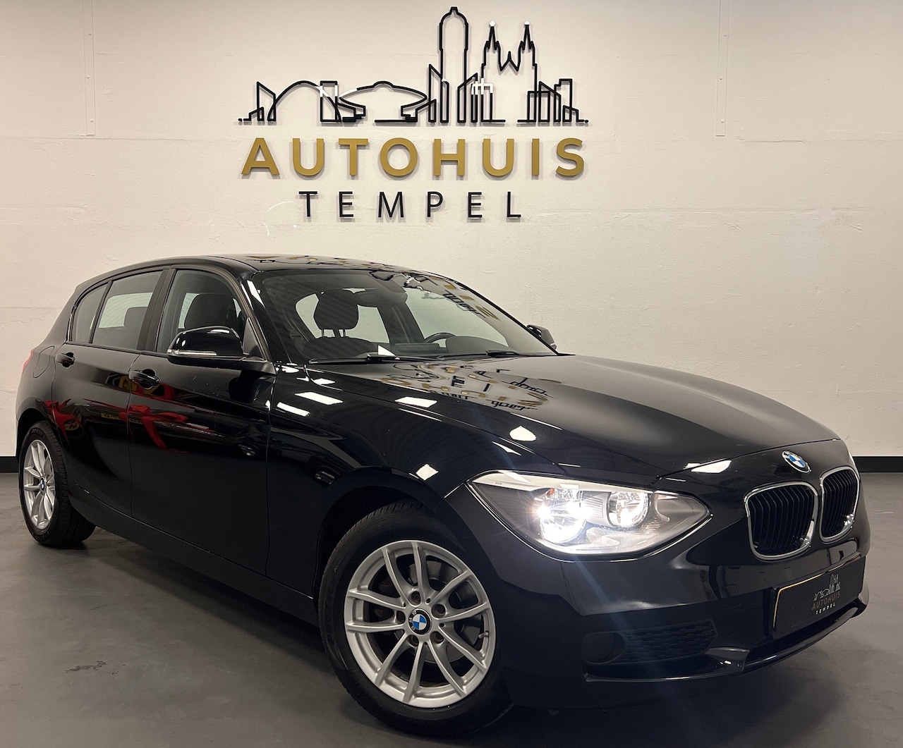 BMW 1-serie - 116i Business Airco 5Drs Stoelverwarming Isofix Pdc 6 Bak Lage Kmstand - AutoWereld.nl