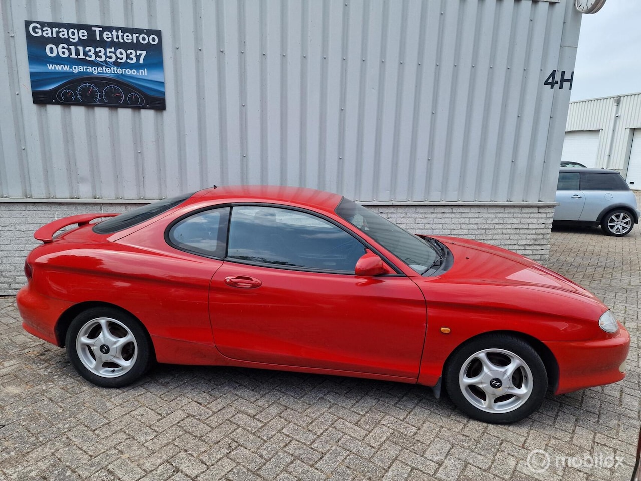 Hyundai Coupé - 2.0i FX Apk, Nap 1e eigenaar - AutoWereld.nl